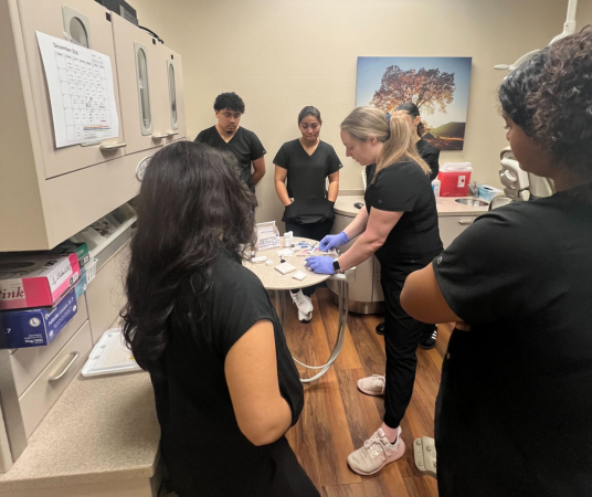 Dental Assistant School Students observing their instructor
